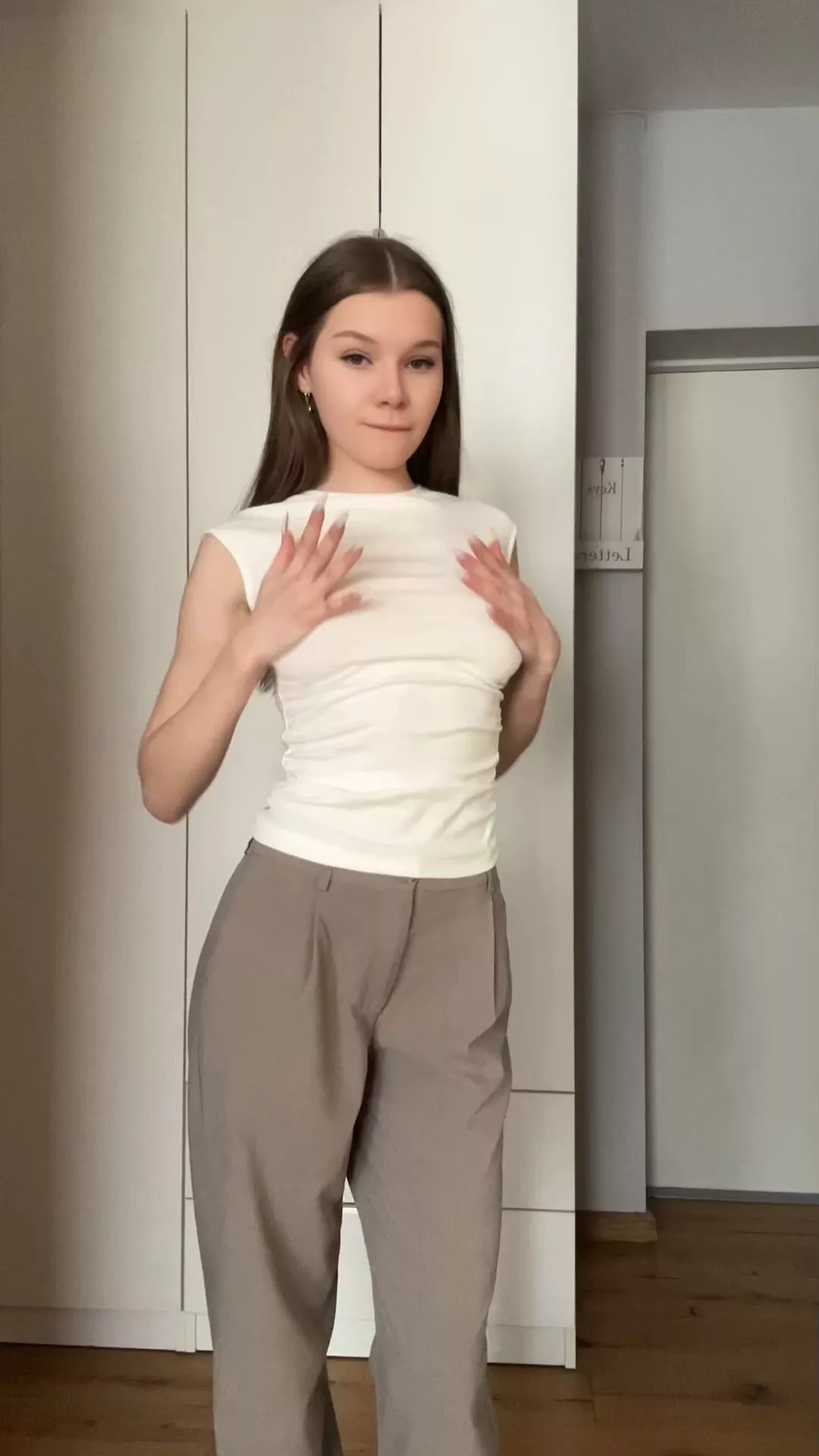 small petite girl striptease