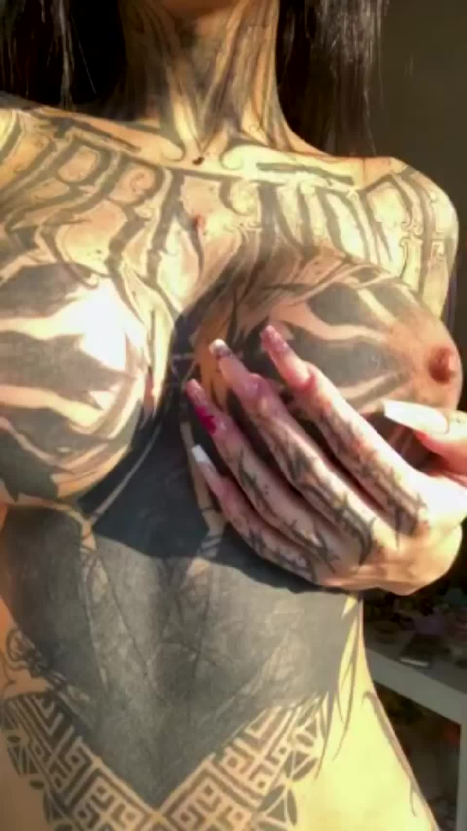suryah tattoed big fake tits